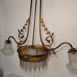 Gold metal chandelier and three-light beads