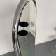Large freestanding chrome metal full-length mirror in 1970s design.