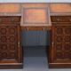 Restored Gothic desk with side bookshelves, drawer, and sloping top by Pugin Gillows.