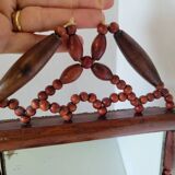 Vintage bohemian mirror in wooden beads