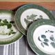 Antique earthenware plates with fruit decoration.