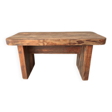 Small rustic wooden bench