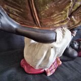 Centerpiece (empty pocket) in resin with African character