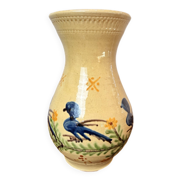 Large vase in glazed pottery decorated with blue birds and flowers.