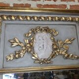 gray and gold patinated trumeau mirror