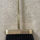 Brass fireplace tools in the style of Maison Baguès.