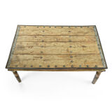 Carved and studded wooden table