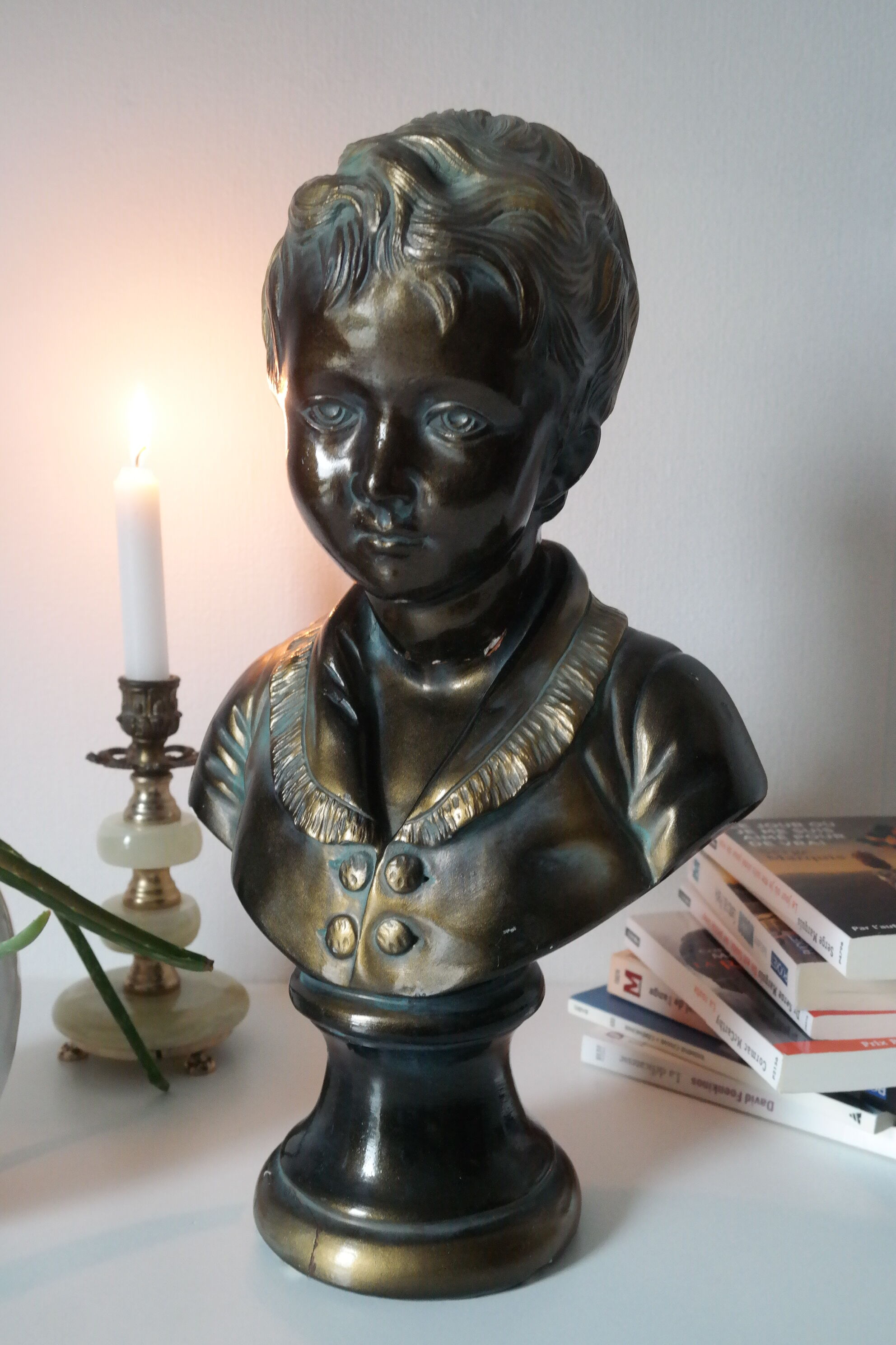 Buste en plâtre garçon patine bronze XXème