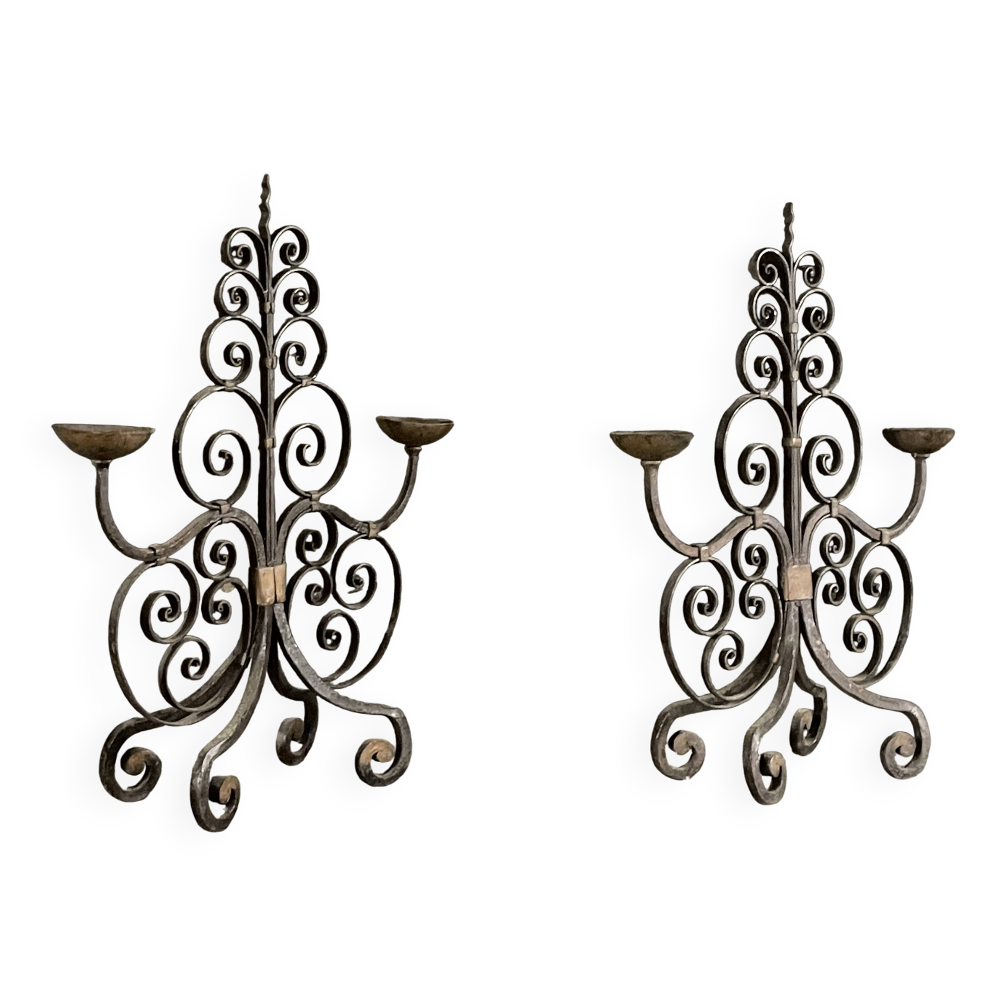 Pair of French wrought iron candelabra from the 19th century.
