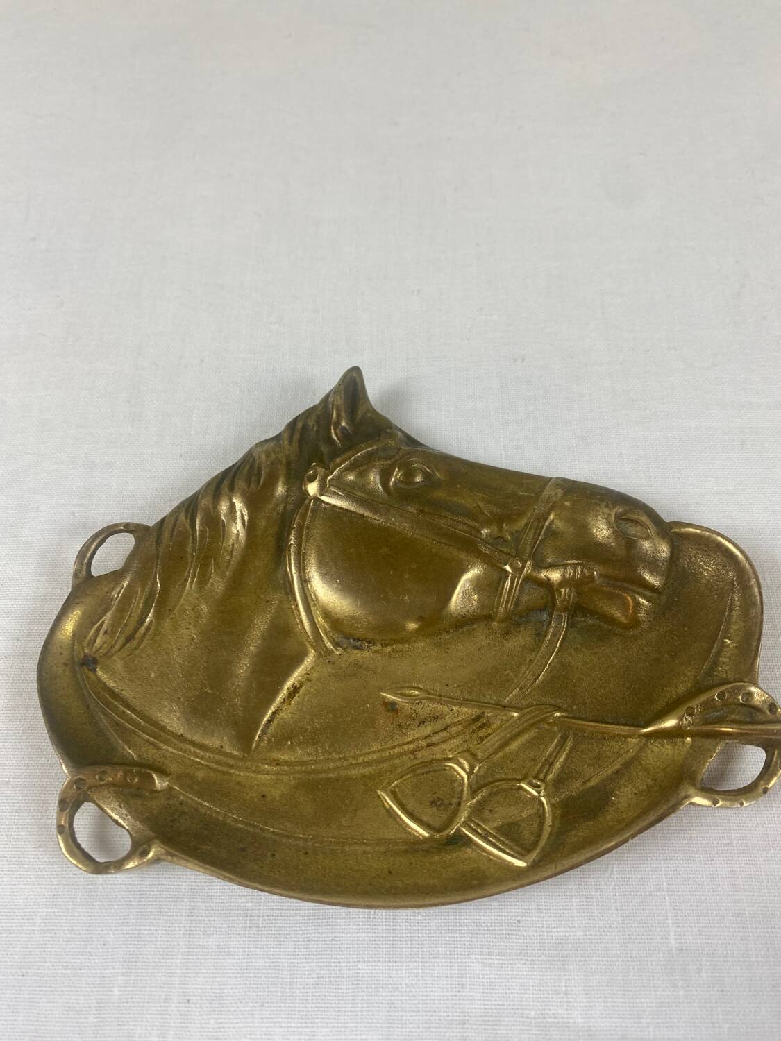 Antique brass pocket emptier