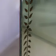 Triptych mirror with eglomisé and pediment, 1940s-50s