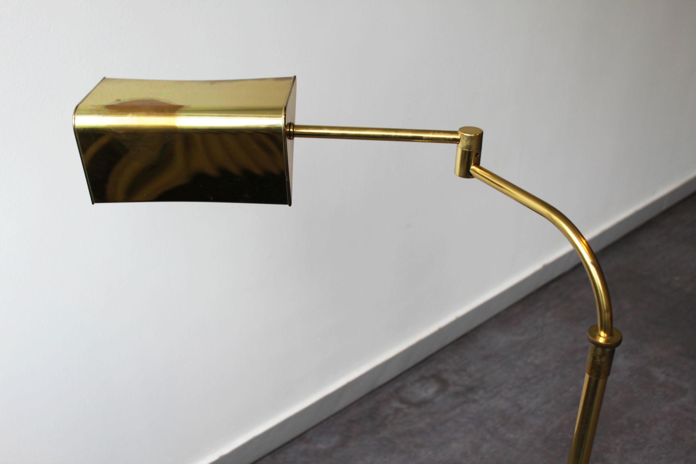 Gilded brass articulated reading light, France, 70's.