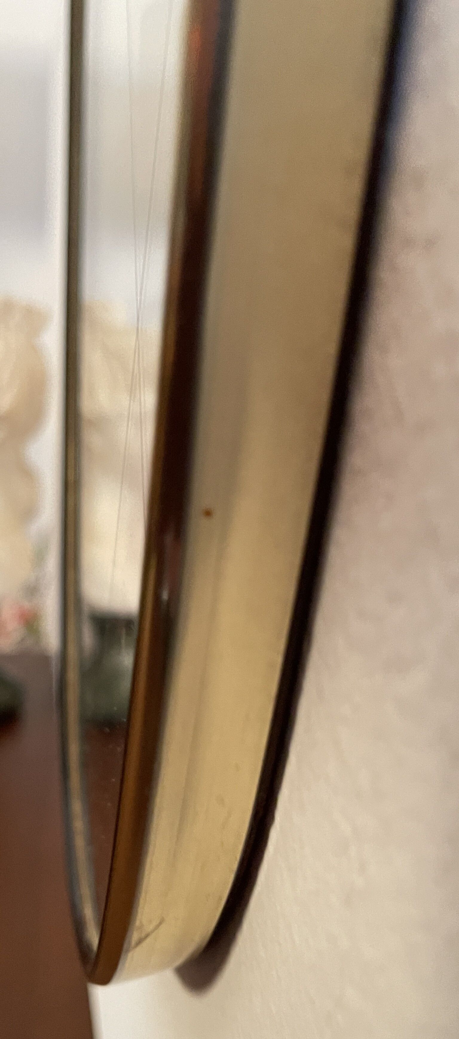 Miroir Art Déco en laiton de forme libre 78 cm