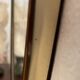 Miroir Art Déco en laiton de forme libre 78 cm