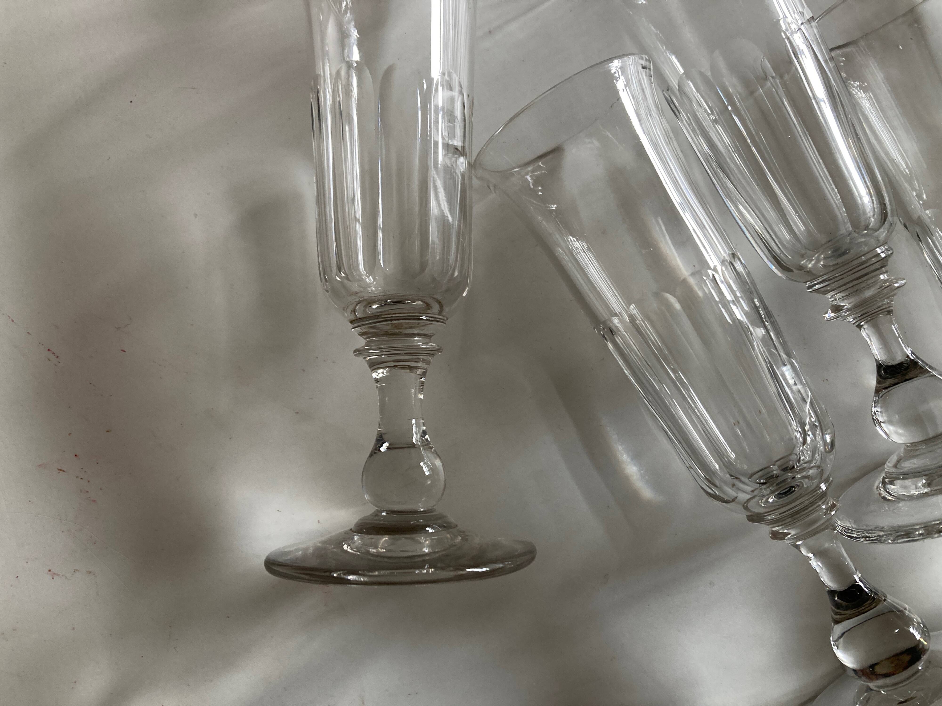 Set of 9 Louis Philippe tulip champagne flutes with flat sides mid 19th