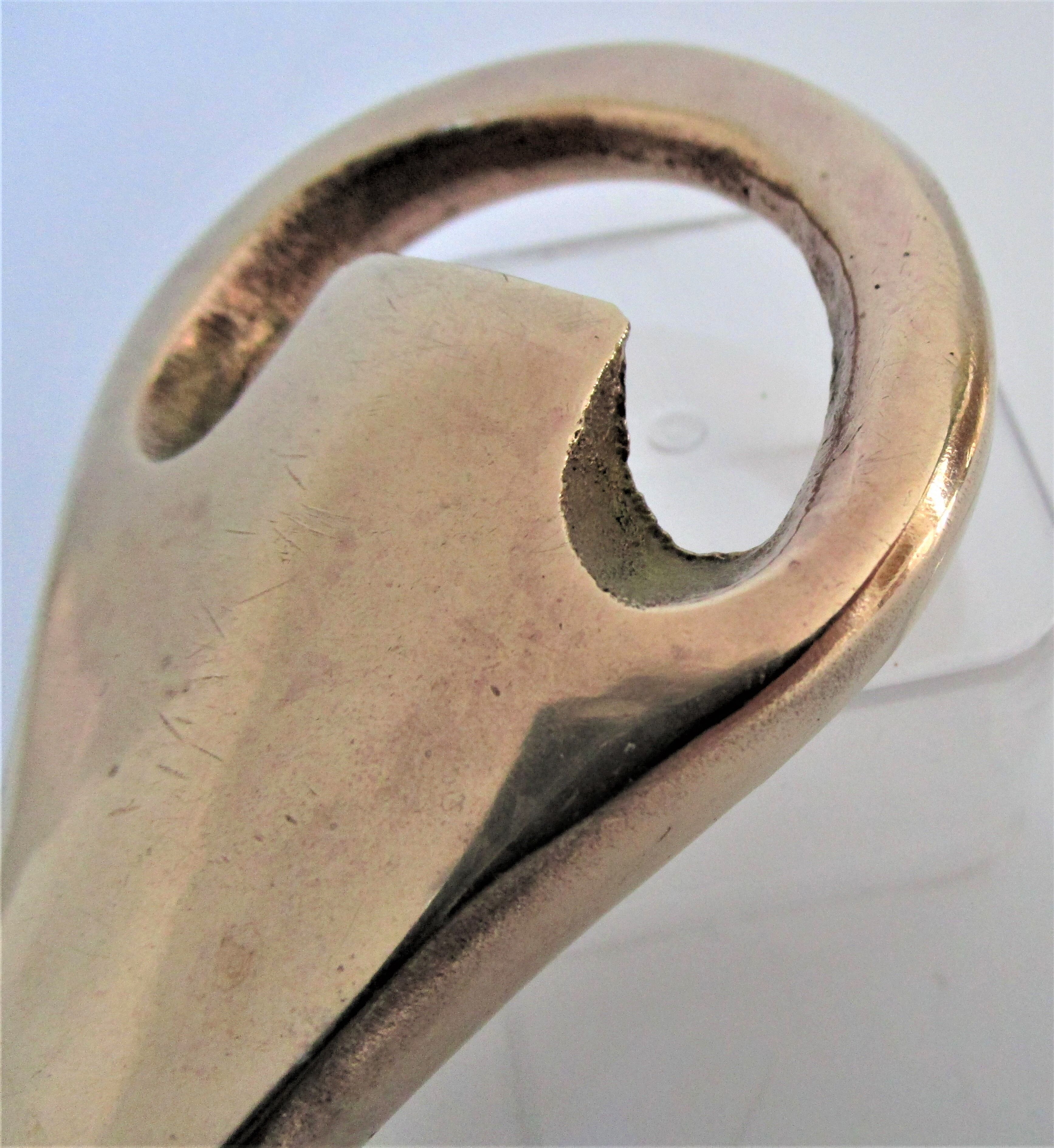 Modernist solid brass bottle opener by Carl Auböck