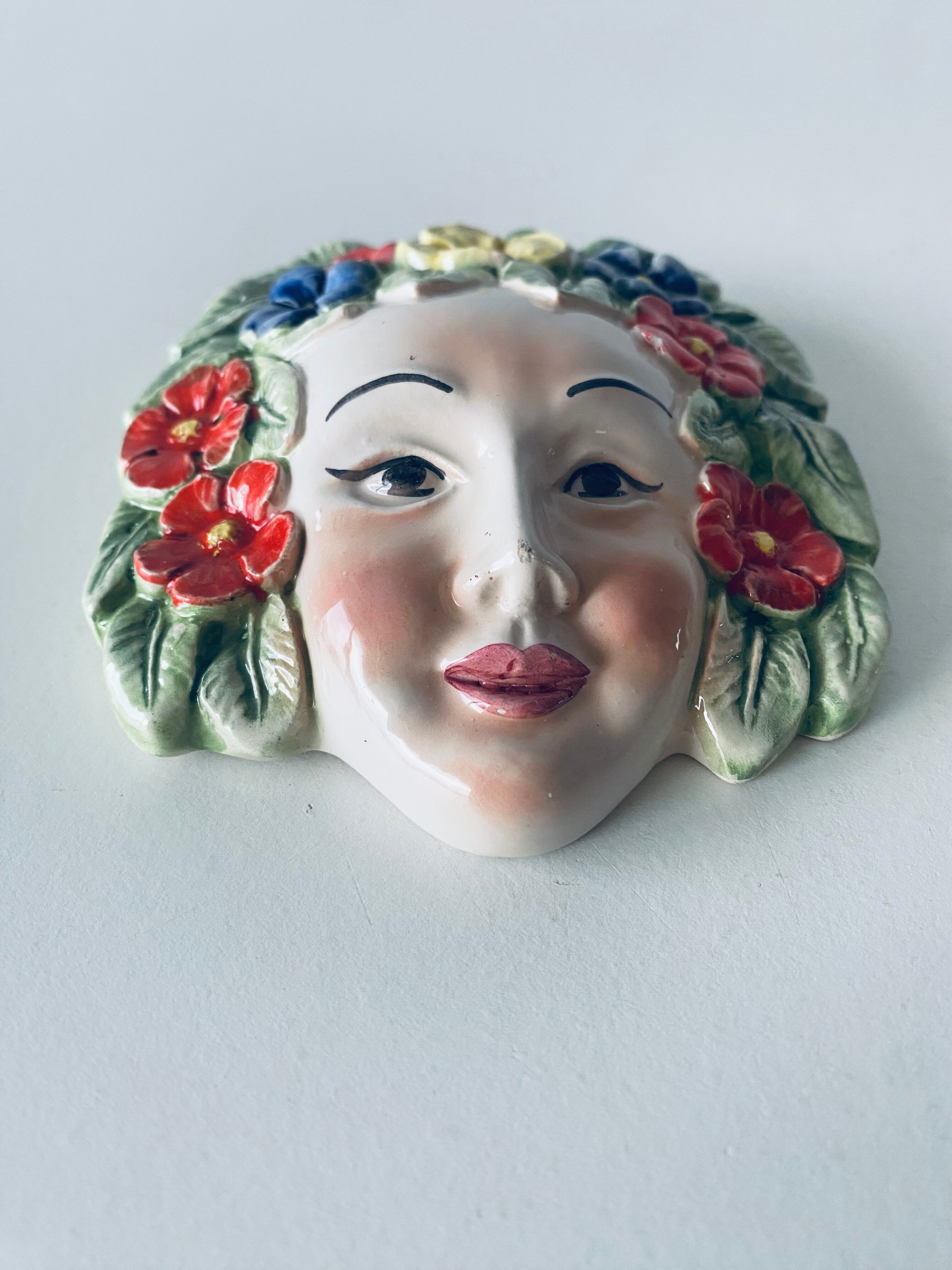 Ceramic wall face signed Il Falco