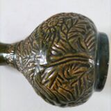 Small glazed vase with raised floral decoration