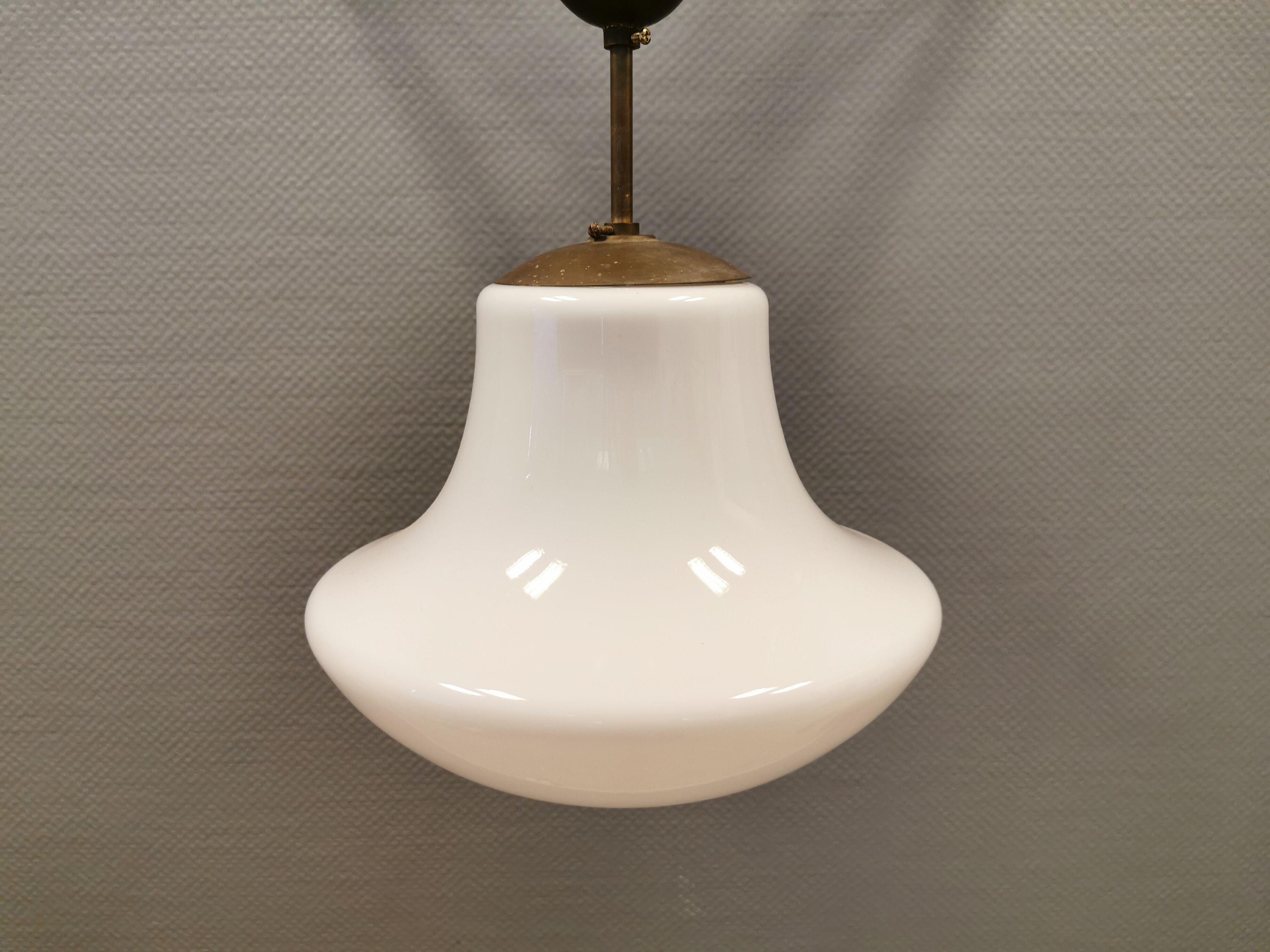 Older ceiling/hanging lamp in milky white opaline glass.