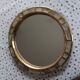Ceramic mirror "gears" by Mithé Espelt