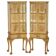 Pair of Art Deco display cabinets circa 1920 in light walnut with Cabriolet legs.