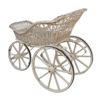 Wooden stroller with a lase and rattan