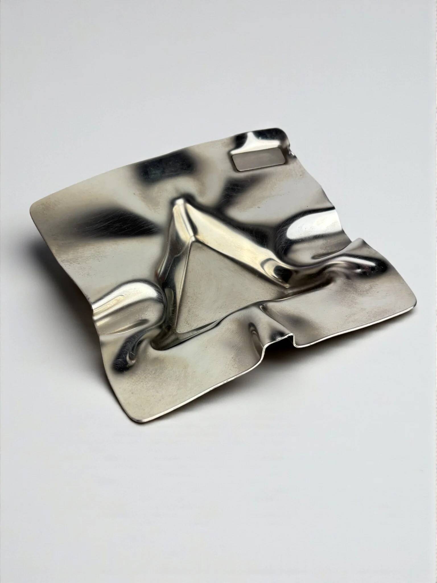 Biomorphic ashtray, stainless steel, Spain, 1970s