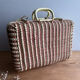 Vintage wicker suitcase