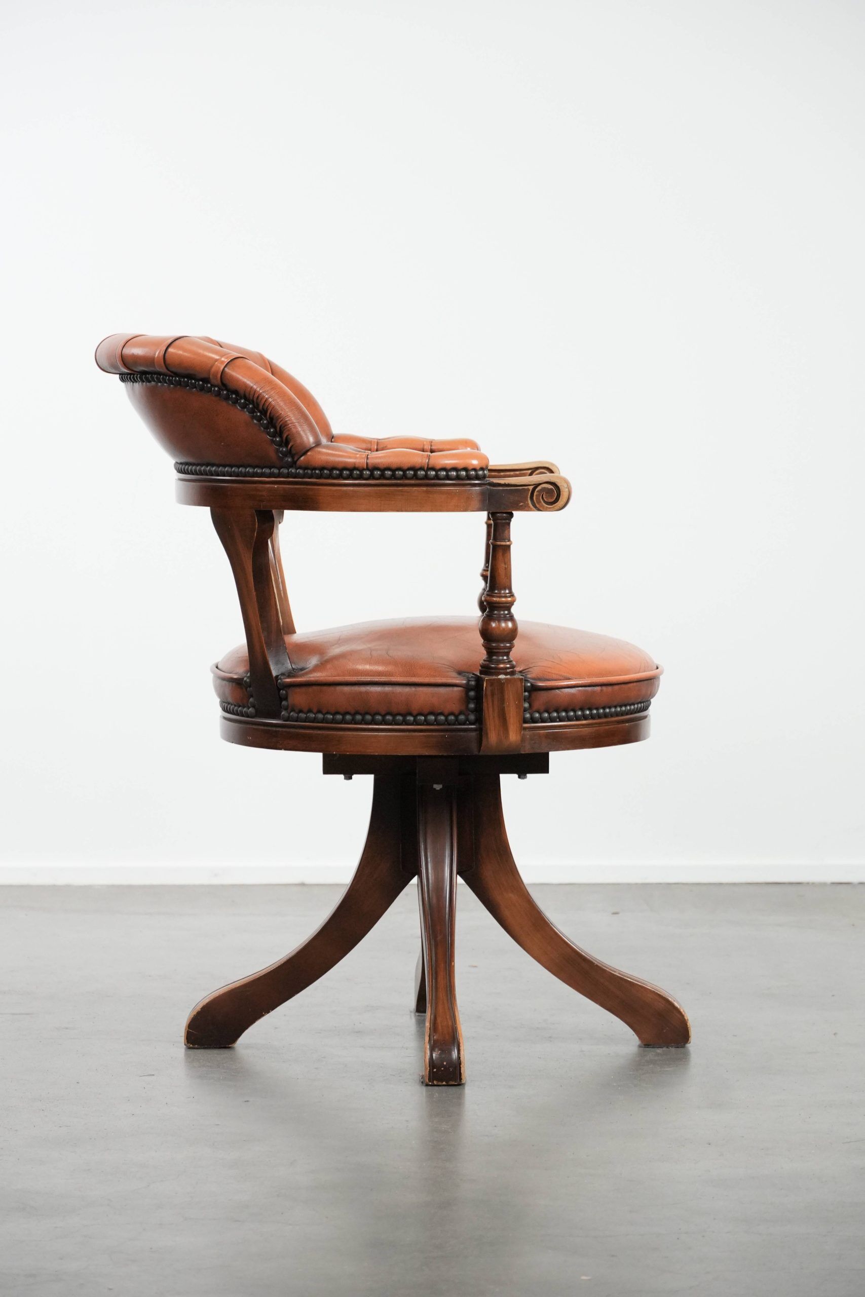 Classic and timeless cow leather and wooden Chesterfield office chair