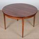 Round extendable dining table in rosewood, Rio, 1960.