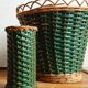 Cache-pot and its matching pencil holder in dyed woven rattan from the 1960s.