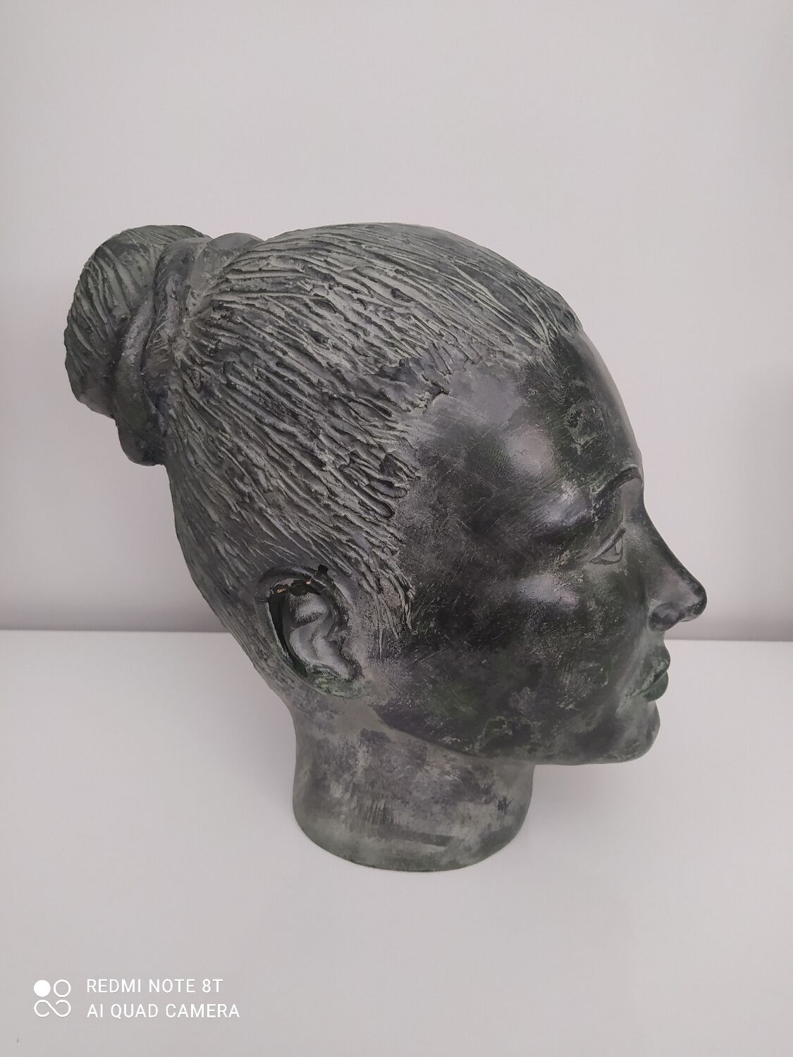 Sculpture face woman in plaster