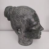 Sculpture face woman in plaster
