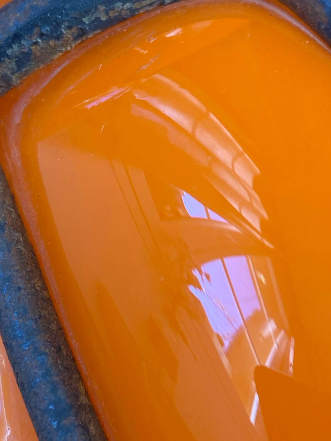 Blown glass vase encased