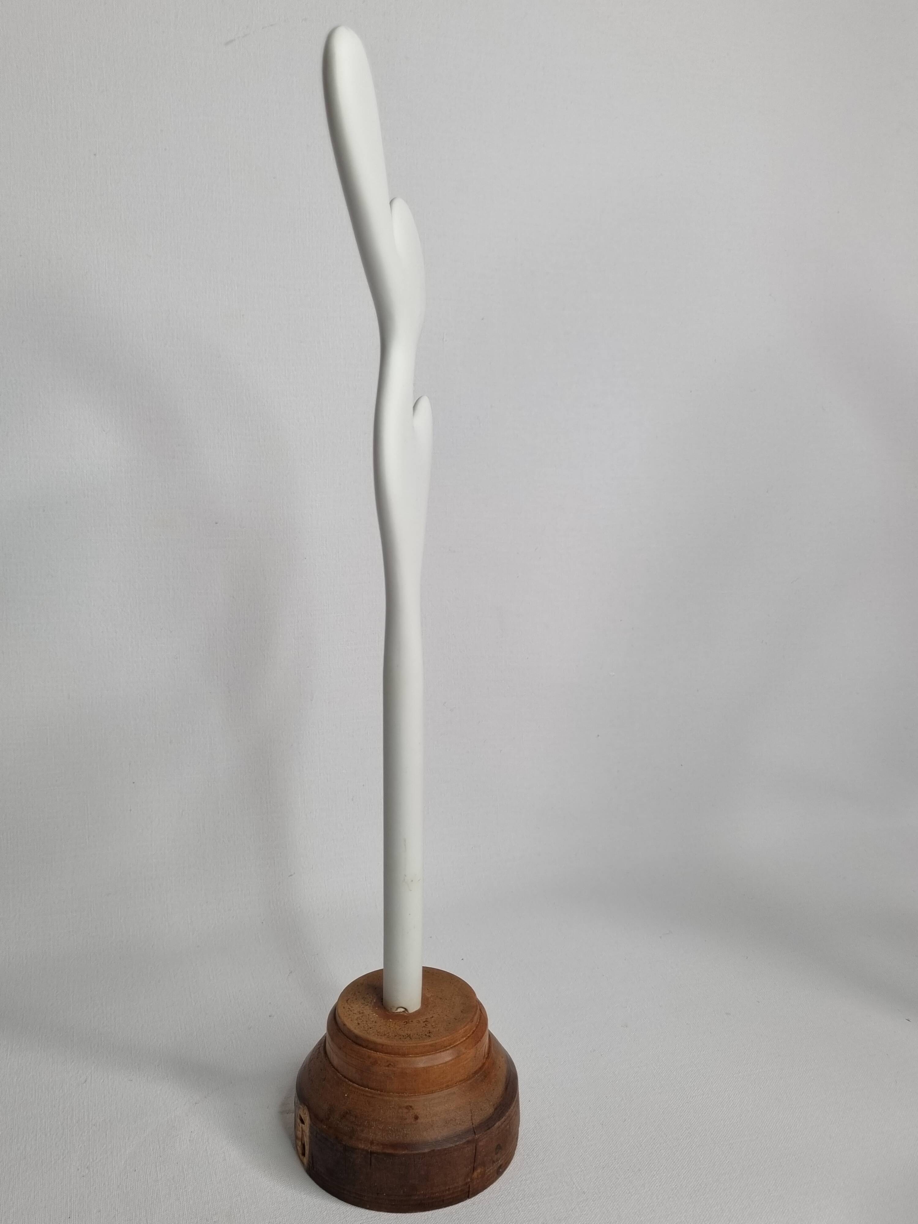 Biomorphic bisque sculpture, on turned wooden base, 37 cm