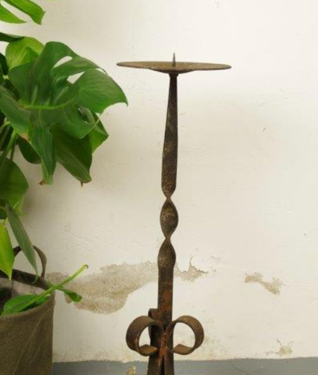 Antique steel candlestick