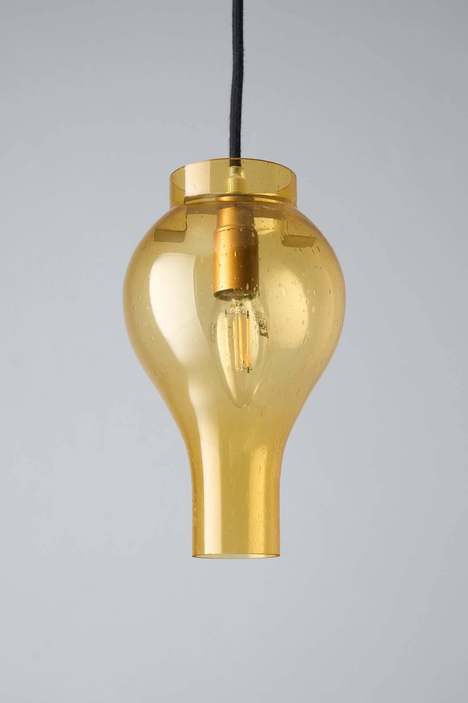 Yellow glass pendant lamp with bubbles