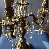 Girandolle in bronze and stamps, early 20th