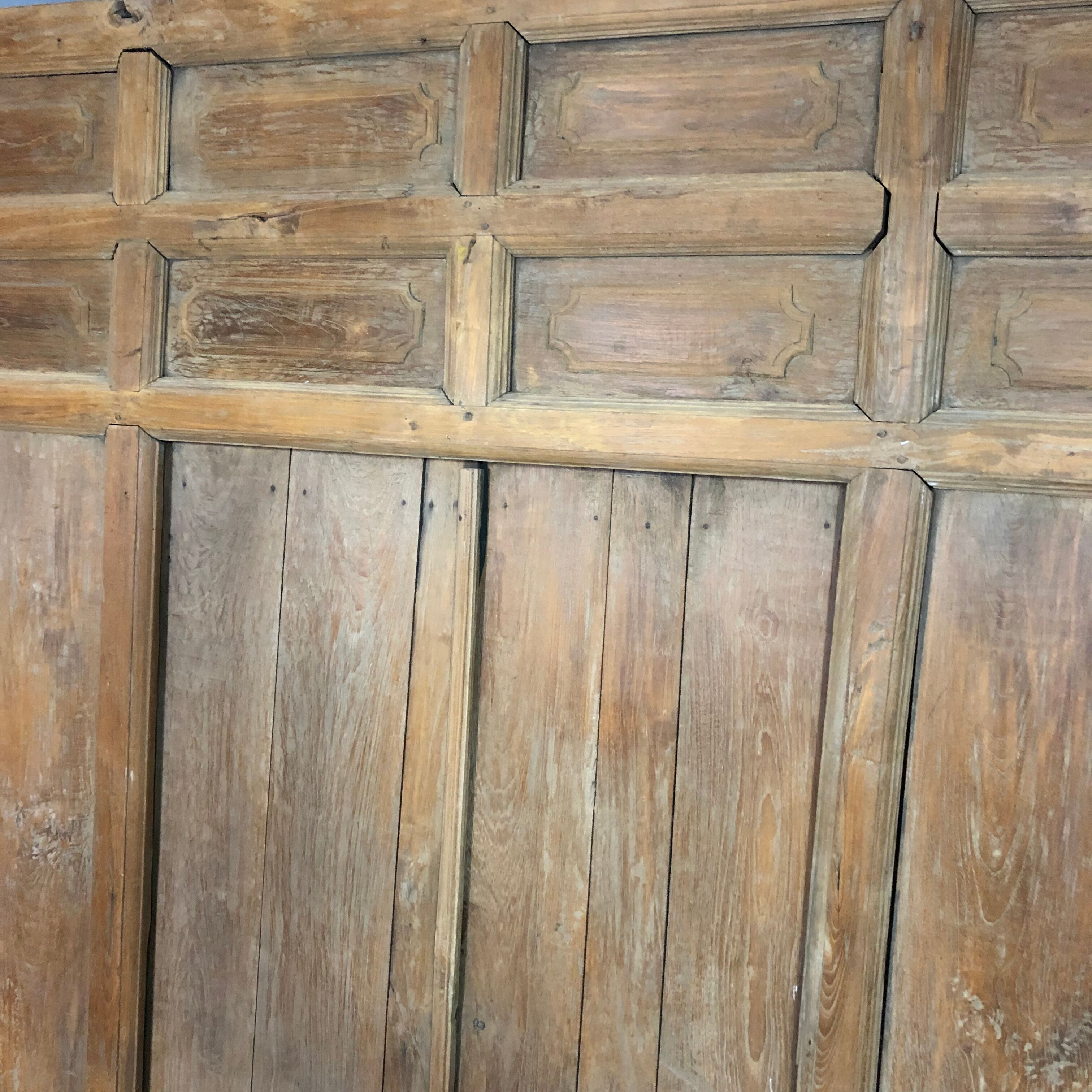Old wooden door with its frame
