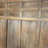 Old wooden door with its frame