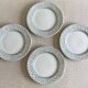 4 English dinner plates.