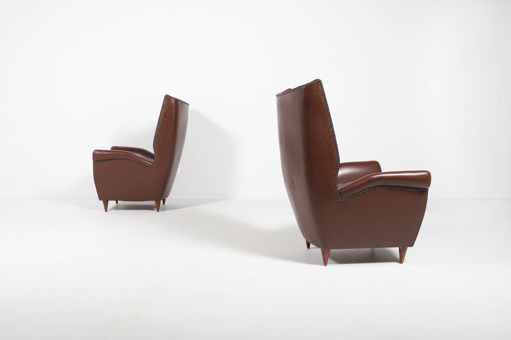 Pair of Italian Wingback Lounge armchairs Gio Ponti style, 1950's