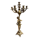 Large bronze candle holder with putti angel