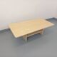 Vintage rectangular coffee table in travertine with magazine rack.