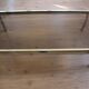 Table basse vintage en verre, laiton et chrome années 70