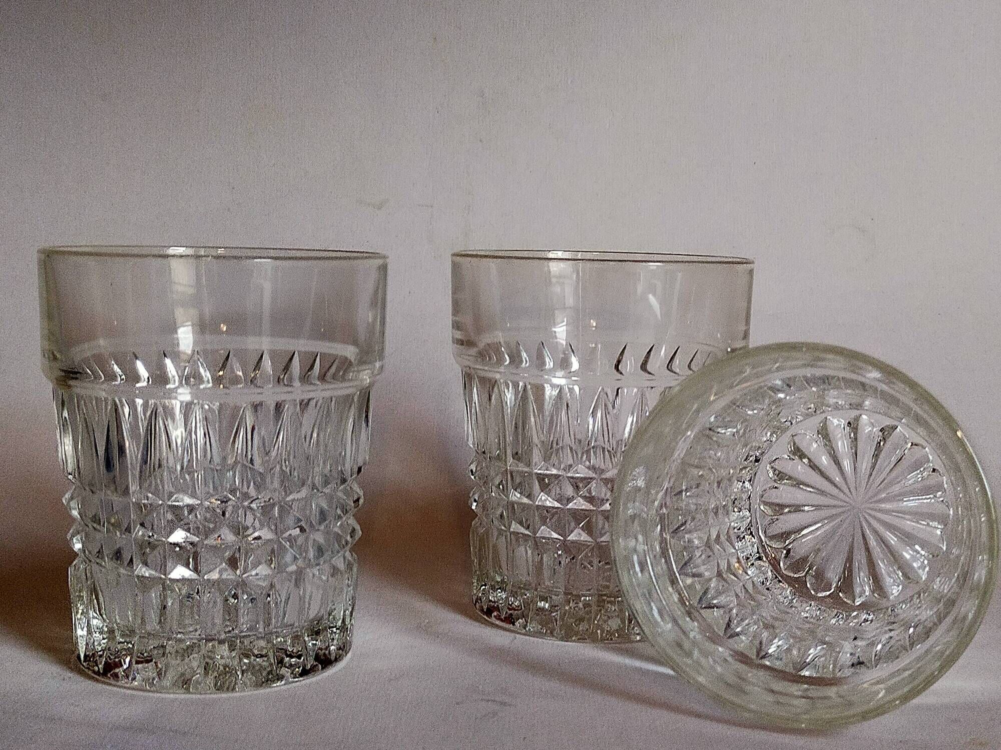 Trio of vintage whiskey glasses in pimpled glass