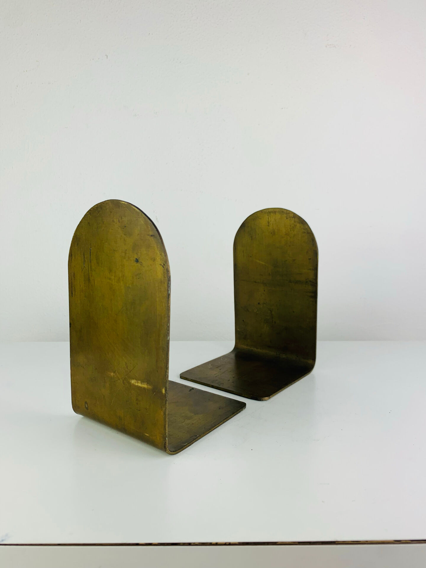 Pair of minimalist vintage raw brass bookends