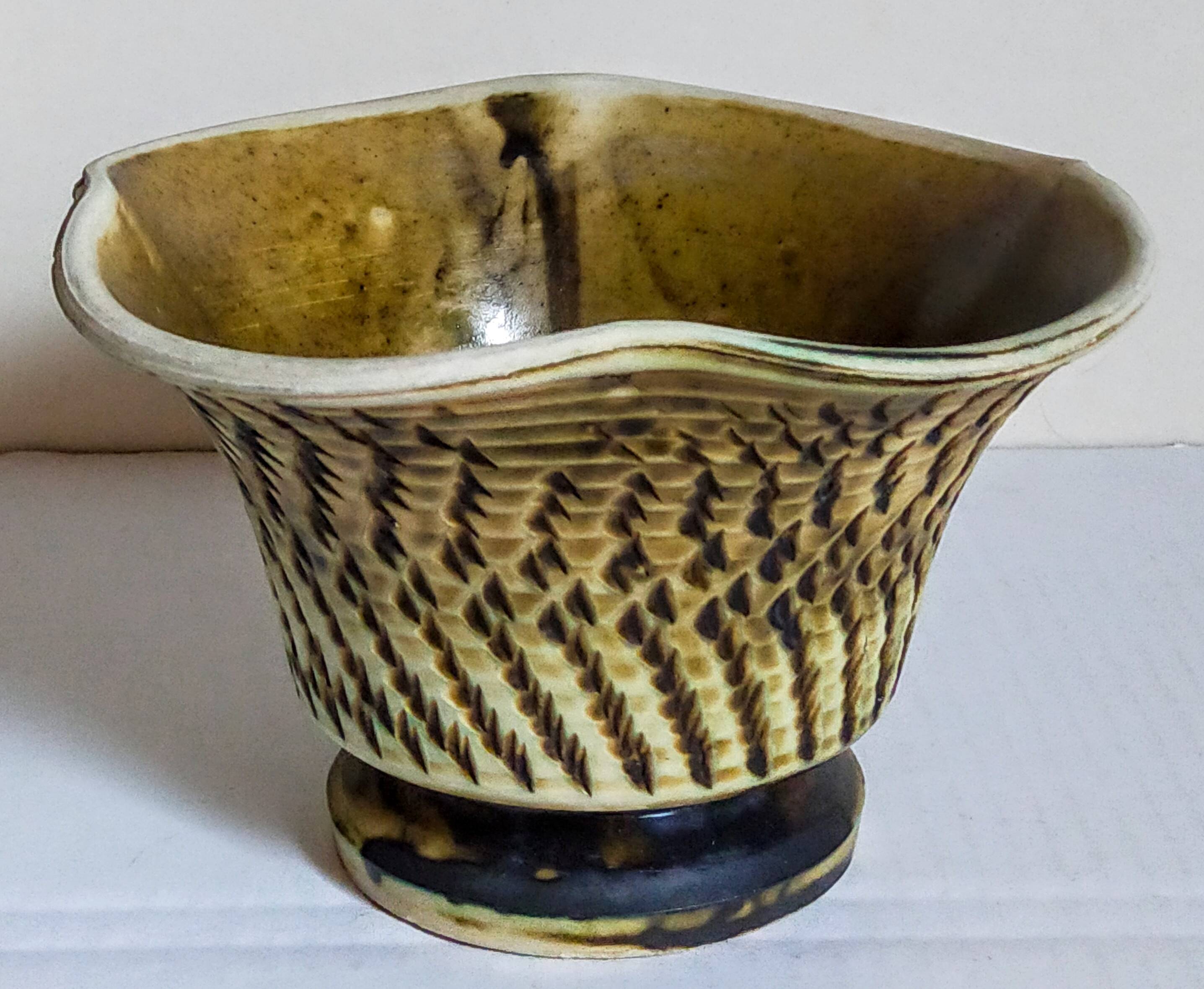 Ceramic planter with vintage scarifications from the 1950s