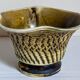 Ceramic planter with vintage scarifications from the 1950s