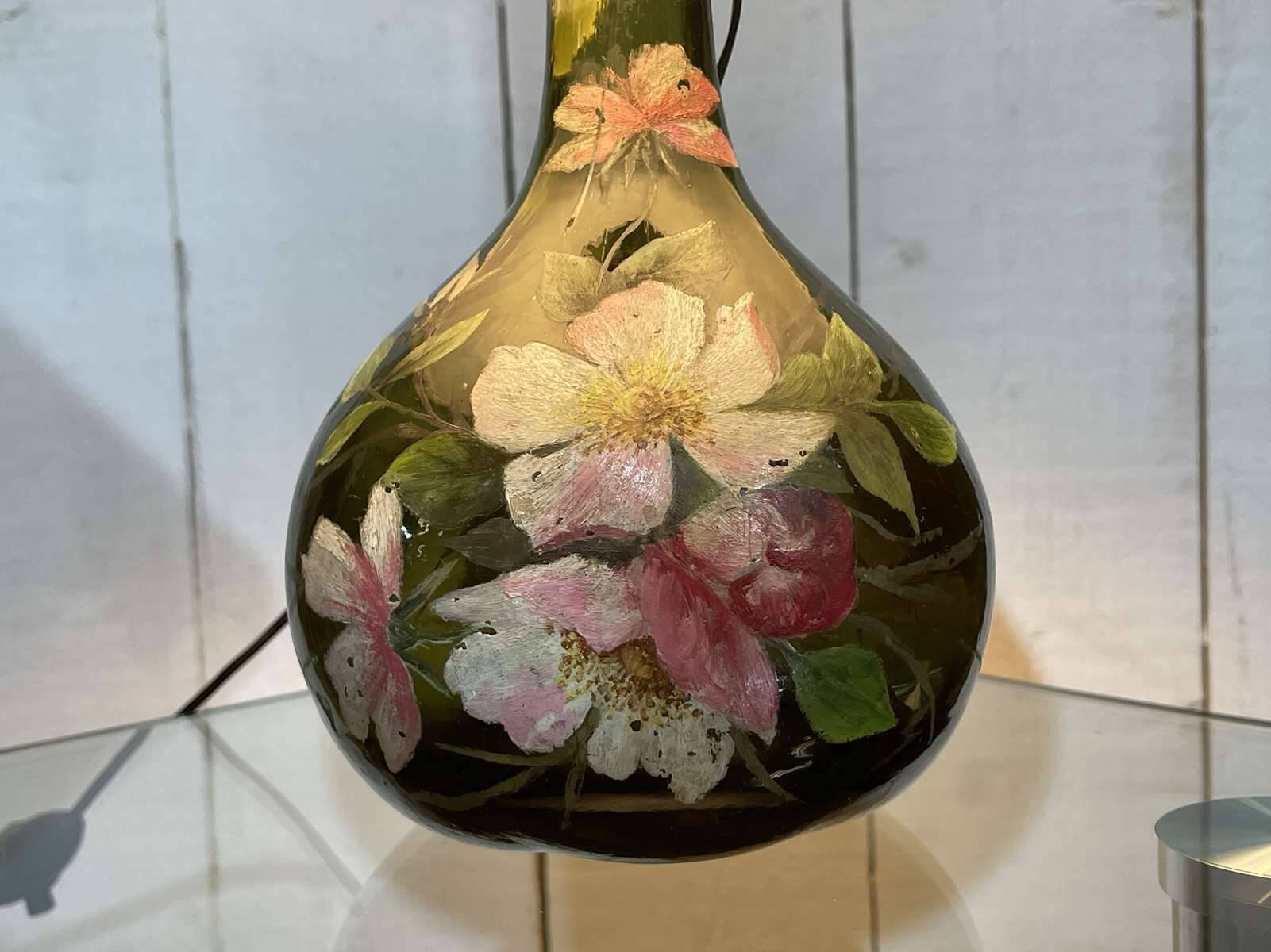 Blown glass lamp painted with a floral design, early 20th century.